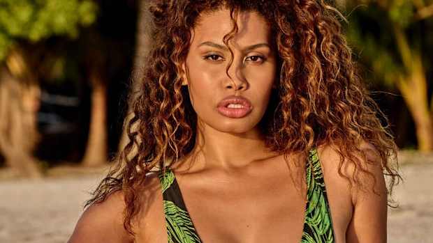 Leyna Bloom on beach for one piece in Belize for SI Swimsuit